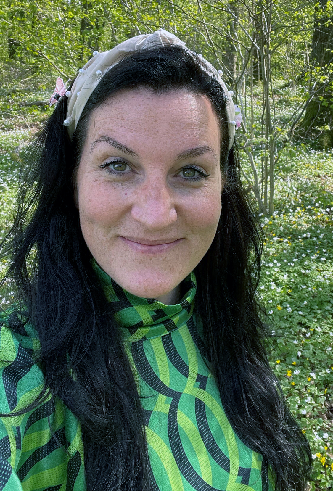 Smiling woman in nature.