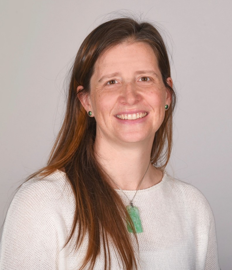 Portrait of Rosalynn Austin wearing a white sweater